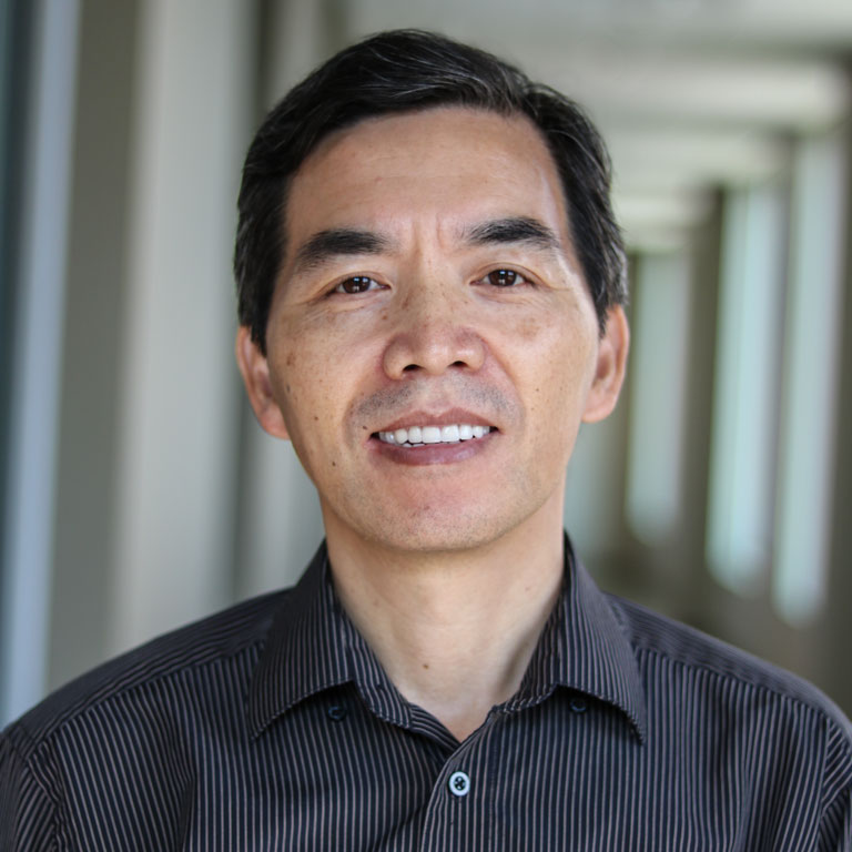 Headshot of faculty member Suosheng Wang 